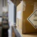 toxic sticker on cardboard box
