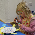 Child partaking in craft activity