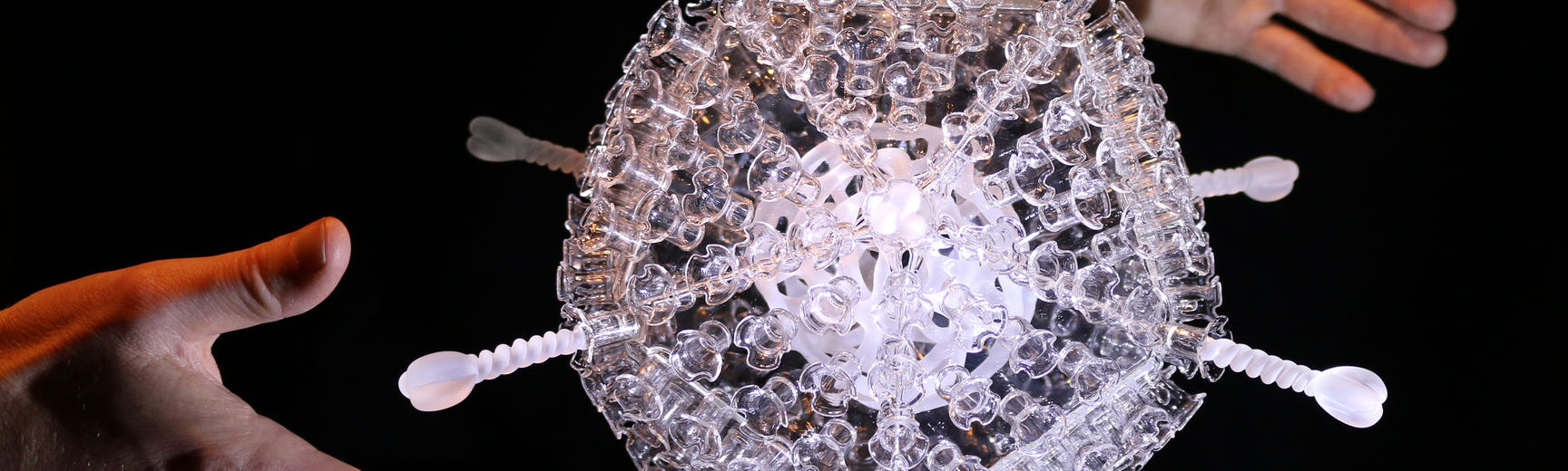 Glass artwork of Covid vaccine