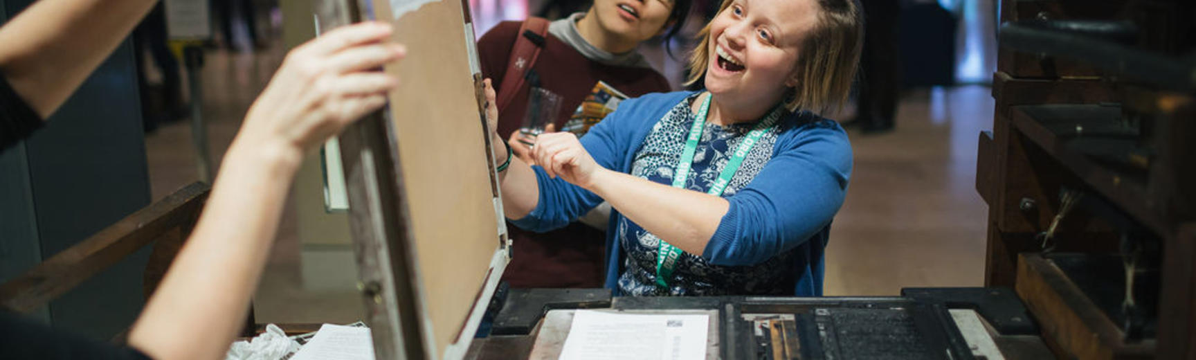 Participants enjoying the printing press