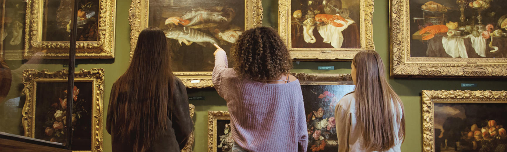 Young people in the Ashmolean Museum looking at art