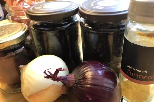 Turmeric, two onions, and several jars
