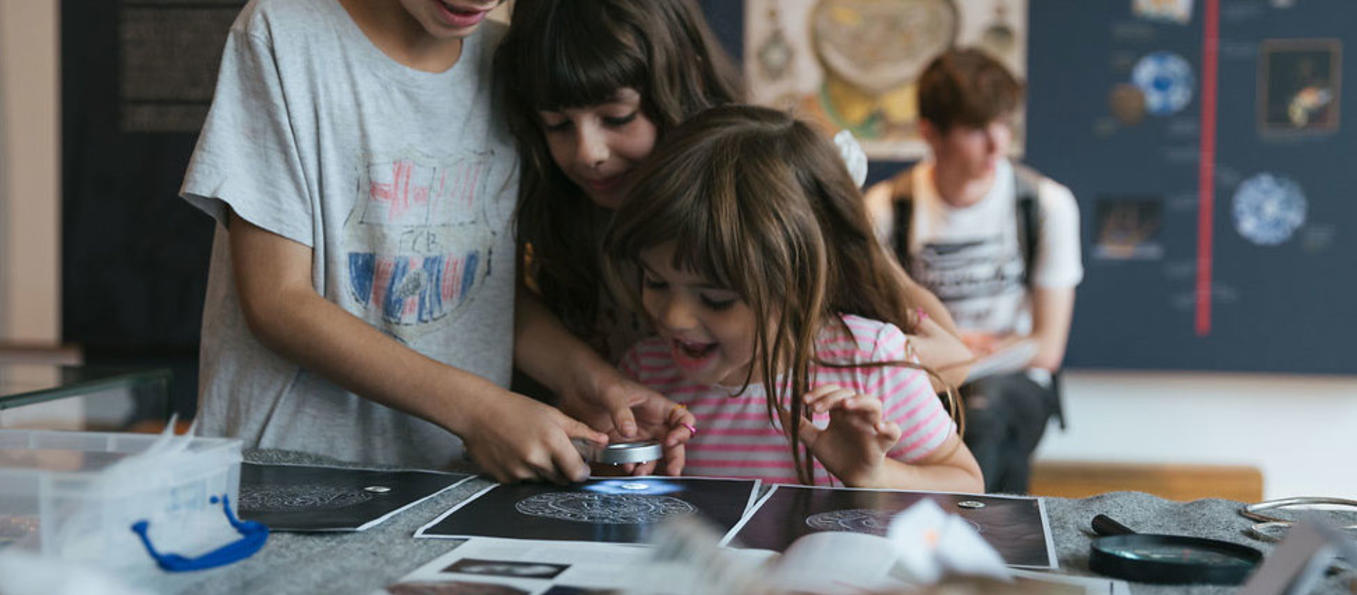 Children engaging with archaeology activity
