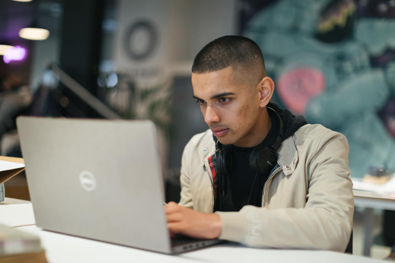 Student working on laptop Student on laptop
