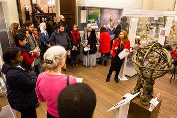 multaka oxford volunteer dhamyaa abass presents to a large group at the History of Science Museum