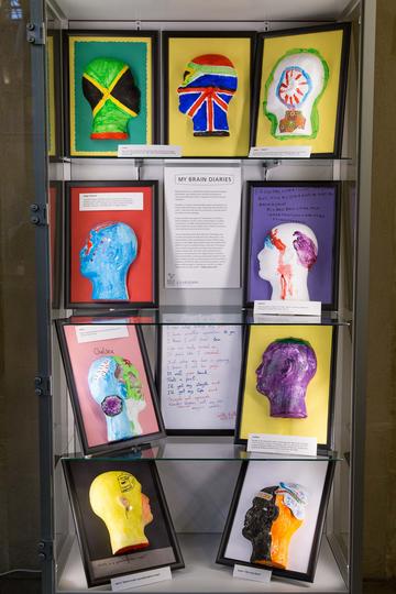 Display of nine painted heads