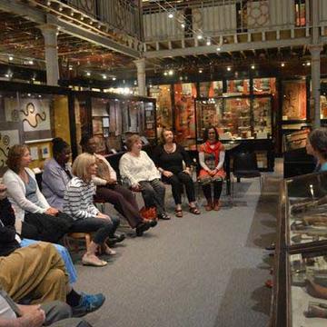 Choir singers on the Pitt Rivers Museum balcony