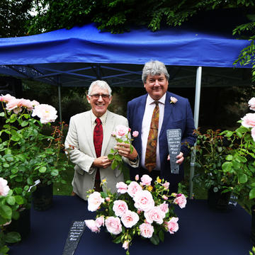 Ian Limmer (left) with Prof Simon Hiscock (right) and the Oxford Physic Rose