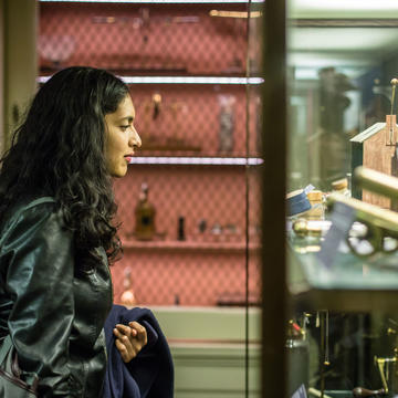 Woman looking at display case. Photography Ian Wallman