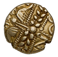 A gold Celtic Coin embossed with a pattern of leaves and abstract shapes